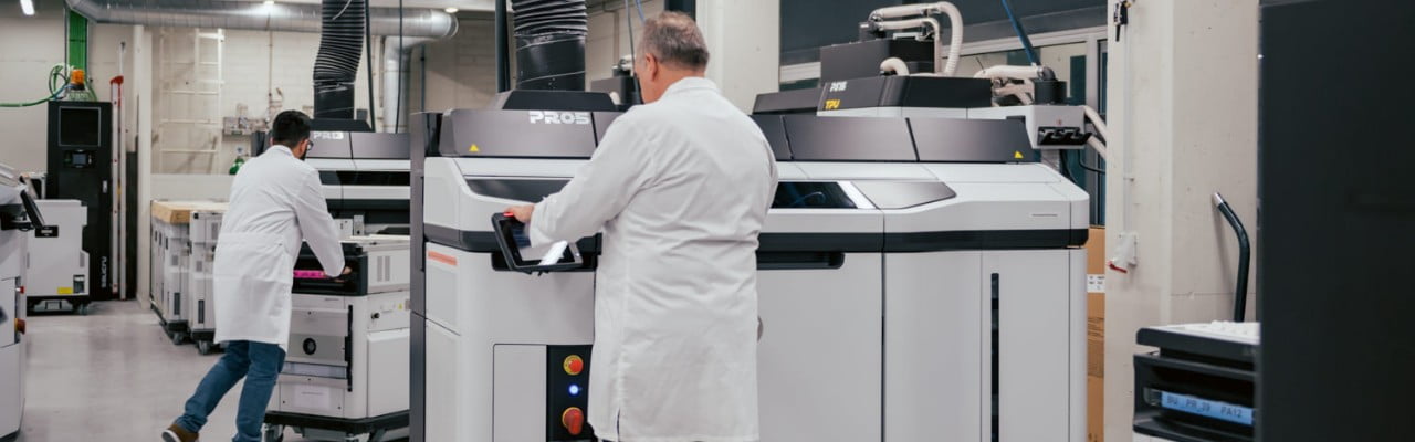 3D engineers working in maintenance of HP Jet Fusion industrial 3D printers